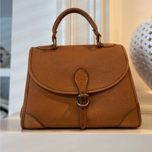 Dooney & Bourke All Weather Leather ®
Medium Carpet Bag Vintage Dooney & Bourke